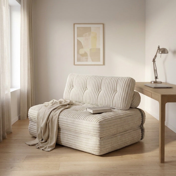 Chauffeuse Baie beige sable utilisée comme petit canapé dans un bureau