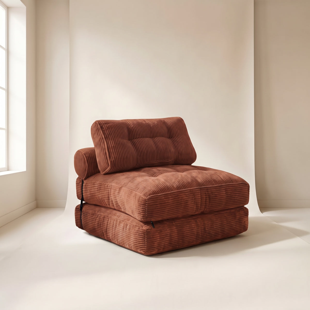Chauffeuse Dune en velours côtelé orange terracotta, pliée en fauteuil